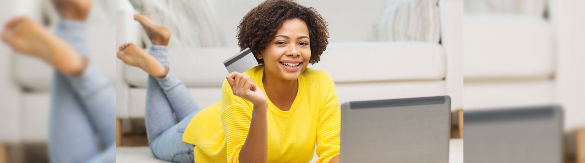 woman holding her debit card
